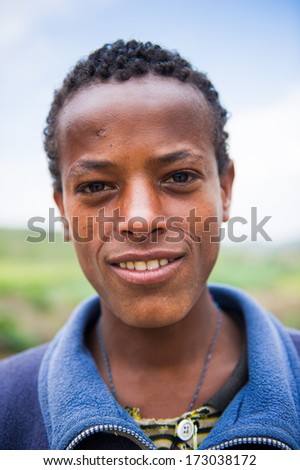 AKSUM, ETHIOPIA - SEP 24, 2011: Portrait of an unidentified Ethiopian boy in Ethiopia, Sep.24, 2011. People in Ethiopia suffer of poverty due to the unstable situation