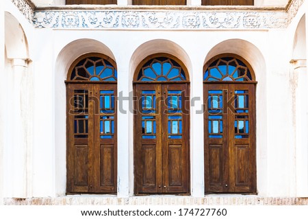 KASHAN, IRAN - JAN 10, 2014: Windows of the  Tabatabaei House,  a historic house in Kashan, Iran on Jan 10, 2014. It was built in early 1880s for the affluent Tabatabaei family.