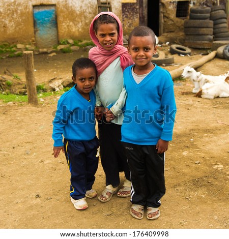 OMO, ETHIOPIA - SEPTEMBER 22, 2011: Unidentified Ethiopian children get together to make pictures. People in Ethiopia suffer of poverty due to the unstable situation