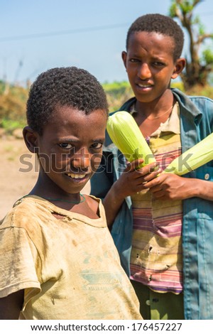 AKSUM, ETHIOPIA - SEPTEMBER 22, 2011: Unidentified Ethiopian boy in the desert. People in Ethiopia suffer of poverty due to the unstable situation