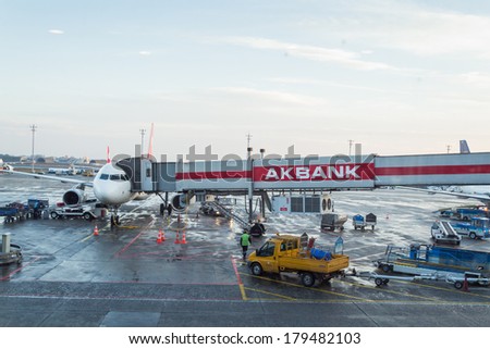 ISTANBUL, TURKEY - MAR 2, 2014: Turkish Airlines aircraft parked in the Istanbul Ataturk Airport, the 17th busiest airport in the world.