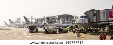 FRANKFURT, GERMANY - MAR 6, 2014: Aircrafts of the Lufthansa company parked at the Frankfurt Intrnational Airport. The Frankfurt Airport is one of the largest airports in the world.