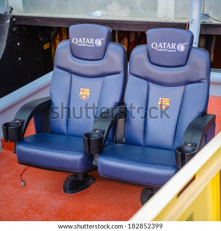 BARCELONA, SPAIN - MAR 15, 2014: Reserve players and coach seats on the Nou Camp Stadium in Barcelona. Camp Nou is the home arena for FC Barcelona and seats 99786 people.