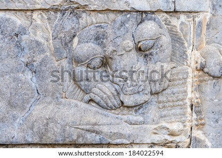 Relief of a lion biting antelope.Persepolis, the ceremonial capital of the Achaemenid Empire. UNESCO World Heritage