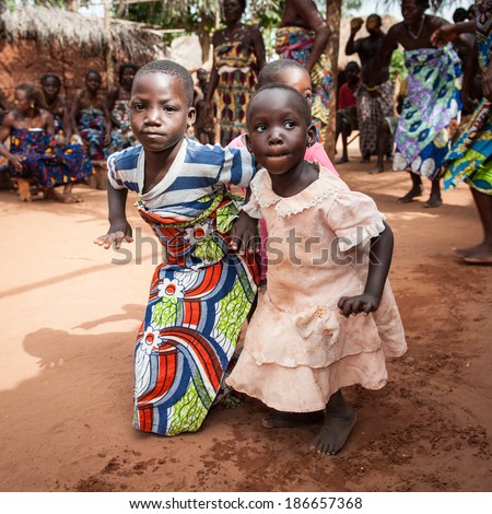 KARA, TOGO - MAR 11, 2012: Unidentified Togolese children in traditional dress dance the religious voodoo dance. Voodoo is the West African religion