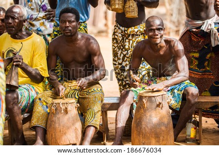 KARA, TOGO - MAR 11, 2012:  Unidentified Togolese drummers make music for the religious voodoo dance performance. Voodoo is the West African religion
