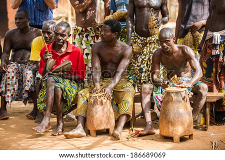 KARA, TOGO - MAR 11, 2012: Unidentified Togolese drummers make music for the religious voodoo dance performance. Voodoo is the West African religion