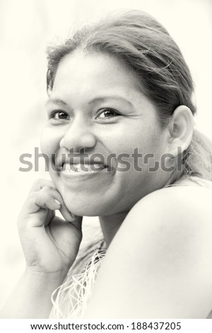 AMAZONIA, PERU - NOV 10, 2010: Unidentified Amazonian indigenous smiling woman. Indigenous people of Amazonia are protected by COICA (Coordinator of Indigenous Organizations of the Amazon River Basin)