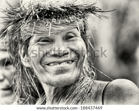 AMAZONIA, PERU - NOV 10, 2010: Unidentified Amazonian man smiles. Indigenous people of Amazonia are protected by COICA (Coordinator of Indigenous Organizations of the Amazon River Basin)