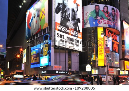 NEW YORK, USA - FEB 11, 2009: Times Square at night time. Times Square is a popular touristic attraction in New York City.