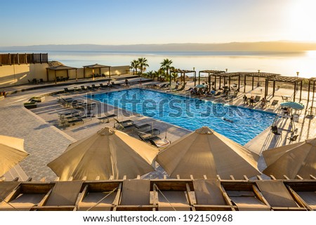 DEAD SEA, JORDAN - APR 30, 2014: SPA Hotel at the Dead Sea coast in Jordan. Dead Sea water is used for medical purposes for the people with skin problems