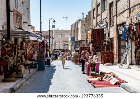 MADABA, JORDAN - APR 28, 2014: Souvenirs street in Madaba, Jordan. Madaba dates from the Middle Bronze Age and called \