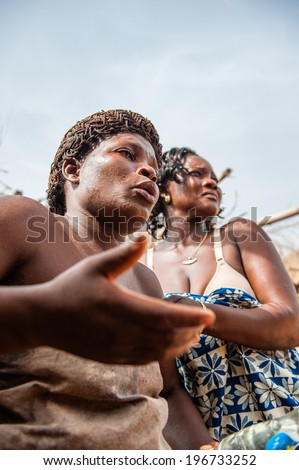 KARA, TOGO - MAR 11, 2012:  Unidentified Togolese woman dances the religious voodoo dance. Voodoo is the West African religion