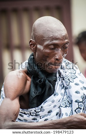 ACCRA, GHANA - MARCH 4, 2012: Unidentified Ghanaian man dance at the local music show in Ghana. Music is the main kind of entertainment in Africa