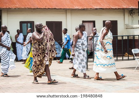 ACCRA, GHANA - MARCH 4, 2012: Unidentified Ghanaian people come to see the local music show in Ghana. People of Ghana suffer of poverty due to the unstable economic situation
