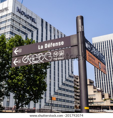 PARIS, FRANCE - JUN 18, 2014: La Defense station metro sign. La Defense is the major business district of the Paris, France