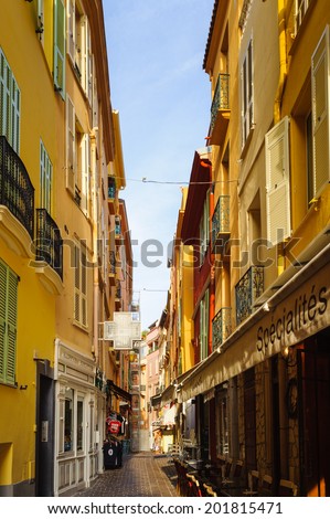 MONACO - JUN 24, 2014: Beautiful small touristic street in Monaco near the Prince\'s Palace of Monaco. Principality of Monaco is the second smallest and the most densely populated country in the world