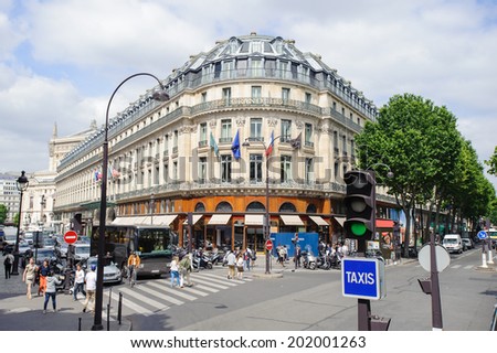 PARIS, FRANCE - JUN 17, 2014: Grand Hotel of the centre of Paris, France. Paris is one of the most popular touristic destinations in the world