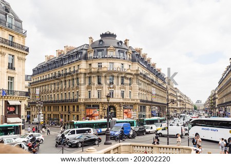 PARIS, FRANCE - JUN 17, 2014: Beautiful architecture of the centre of Paris, France. Paris is one of the most popular touristic destinations in the world