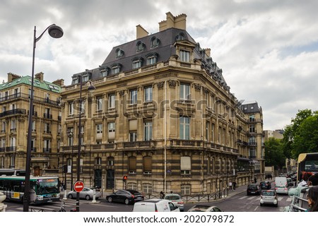 PARIS, FRANCE - JUN 17, 2014: Beautiful architecture of the laeft bank of the river Seine  of Paris, France. Paris is one of the most popular touristic destinations in the world