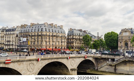 PARIS, FRANCE - JUN 17, 2014: Pont Neuf,  the oldest standing bridge across the river Seine in Paris, France.