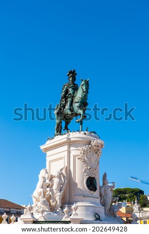 LISBON, PORTUGAL - JUN 20, 2014: Statue of King Jose I on the Commerce Square (Praca do Comercio) in Lisbon, Portugal. The Square was destoryed by the 1755  Earthquake and then it was reconstructed