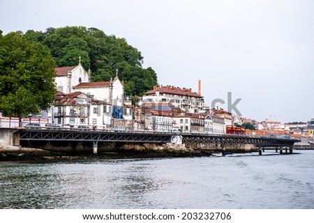 PORTO, PORTUGAL - JUN 21, 2014: Beautiful houses on the coast of the River Douro in Porto, Portugal. View from the River Douro, one of the major rivers of the Iberian Peninsula (2157 m)