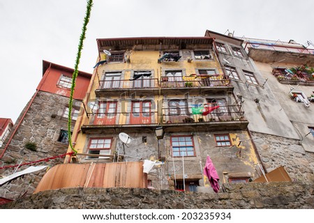 PORTO, PORTUGAL - JUN 21, 2014:  Architecture of a traditional small quarter of Porto, Portugal. Porto is the second largest city in Portugal and it was called the European Culture Capital in 2001