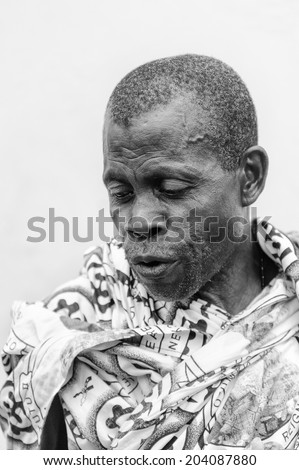 ACCARA, GHANA - MAR 4, 2012: Unidentified Ghanaian old man portrait in black and white. People of Ghana suffer of poverty due to the unstable economical situation