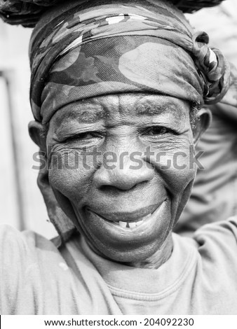 ACCARA, GHANA - MAR 3, 2012: Unidentified Ghanaian old woman portrait in black and white. People of Ghana suffer of poverty due to the unstable economical situation