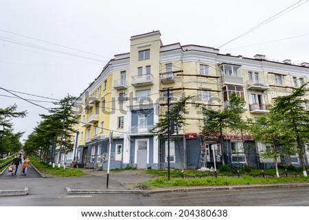 MAGADAN, RUSSIA - JUL 4, 2014: Soviet architecture of Magadan, Russia. Magadan was founded in 1929 and now it's the administrative centre of the Magadan region.