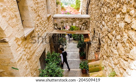 SAINT-PAUL-DE-VENCE, FRANCE - JUN 25, 2014: Old architecture and street of Saint Paul de Vence, one of the oldest towns of the Frence Riviera. Town of painters and galleries