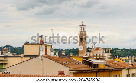 VERONA, ITALY - JUN 26, 2014: Panorama of the roof tops of Verona, Italy. City of Verona is a UNESCO World Heritage site