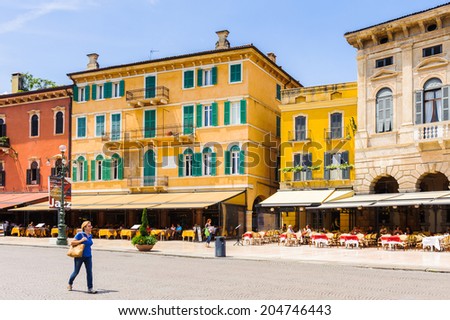 VERONA, ITALY - JUN 26, 2014: Piazza Bra and its restaurants , the largest square in Verona, Italy. City of Verona is a UNESCO World Heritage site