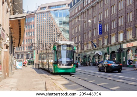 HELSINKI, FINLAND - JULY 26, 2014:  Tram way  in  Helsinki, Finland. Helsinki was chosen to be the World Design Capital for 2012