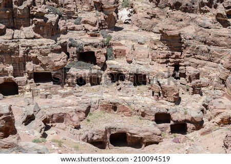 Caves in the rocks of  Petra, the capital of the kingdom of the Nabateans in ancient times. UNESCO World Heritage