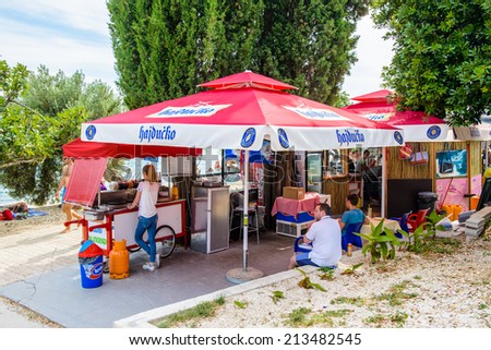DALMATIA, REGION OF SPLIT, CROATIA - AUG 20, 2014: A kiosk with fast food on the Adriatic coast. Coast of the Adriatic Sea in Dalmatia became a popular destination for millions of tourists