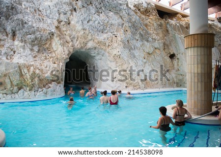 MISKOLC, HUNGARY - AUG 29, 2014: Cave and pool of the Barlangfurdo, a thermal bath complex in a natural cave in Miskolctapolca, which is part of the city of Miskolc, Hungary