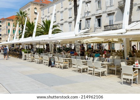 SPLIT, CROATIA - AUG 22, 2014: Unidentified people in a restaurant in Split, Croatia. Split is the largest city of the region of Dalmatia and a popular touristic destination
