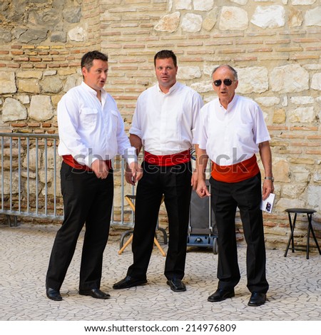 SPLIT, CROATIA - AUG 22, 2014: Unidentified local Croatian musicians make sing the traditional song in Split, Croatia. Split is the largest city of the region of Dalmatia
