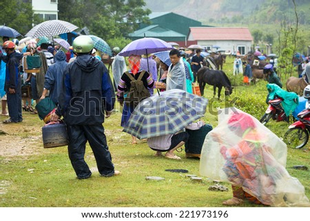 BAC HA, VIETNAM - SEP 21, 2014: Unidentified people sell and buy at the Bac Ha Market, a large Sunday market with people wearing beautiful colored minoritiesÃ?Â¢?? costumes