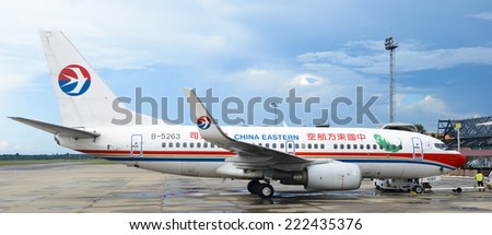 SIEM REAP, CAMBODIA - SEP 26, 2014: Chinese eastern airlines aircraft in the Siemreap International Airport. It is the busiest airport in Cambodia in terms of passenger traffic.