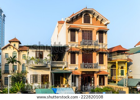HA NOI, VIETNAM - SEP 23, 2014: Narrow houses on the street of Hanoi. Hanoi is the capital and the second largest city in Vietnam