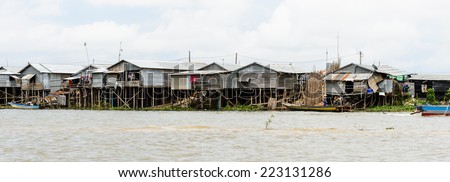 LAKE TONLE SAP, COMBODIA - SEP 28, 2014: Houses on the Tonle Sap. Lake Tonle Sap is the largest freshwater lake in Southeast Asia, a UNESCO biosphere since 1997