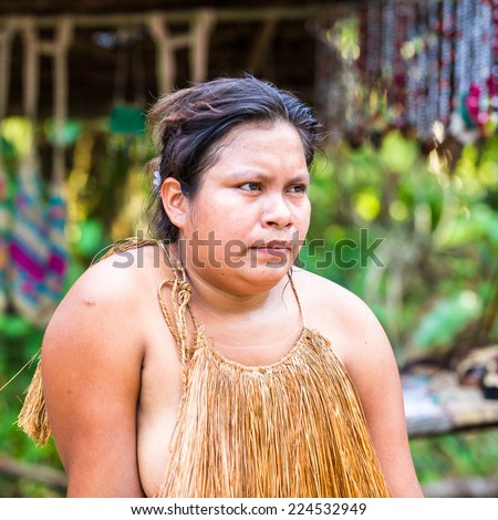 AMAZONIA, PERU - NOV 10, 2010: Unidentified Amazonian indigenous woman. Indigenous people of Amazonia are protected by  COICA (Coordinator of Indigenous Organizations of the Amazon River Basin)