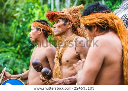 AMAZONIA, PERU - NOV 10, 2010: Unidentified Amazonian local musicians. Indigenous people of Amazonia are protected by COICA (Coordinator of Indigenous Organizations of the Amazon River Basin)