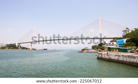 HA LONG CITY, VIETNAM - SEP 23, 2014: Bridge of the Halong city where many touristic boat start jorneys over the Halong bay which is UNESCO World heritage