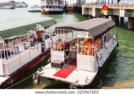 HA LONG CITY, VIETNAM - SEP 23, 2014: Boat at the port of the Halong city where many touristic boat start jorneys over the Halong bay which is UNESCO World heritage