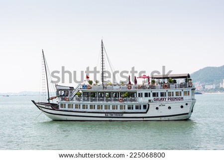 HA LONG CITY, VIETNAM - SEP 23, 2014: Boat near the port of the Halong city where many touristic boat start jorneys over the Halong bay which is UNESCO World heritage