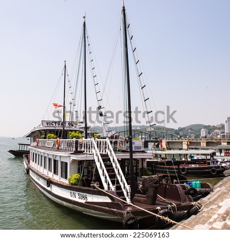 HA LONG CITY, VIETNAM - SEP 23, 2014: Passenger boat at the port of the Halong city where many touristic boat start jorneys over the Halong bay which is UNESCO World heritage